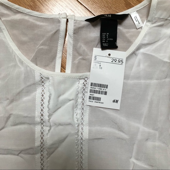 NWT H&M Silky, Sheer White Short-Sleeved Blouse with Peplum Waist - Picture 2 of 7